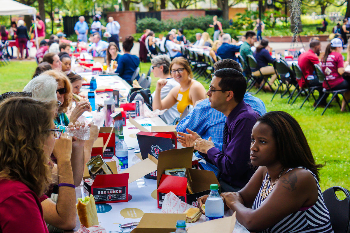 Photo of facutly, staff and students participating in The Longest Table @ FSU