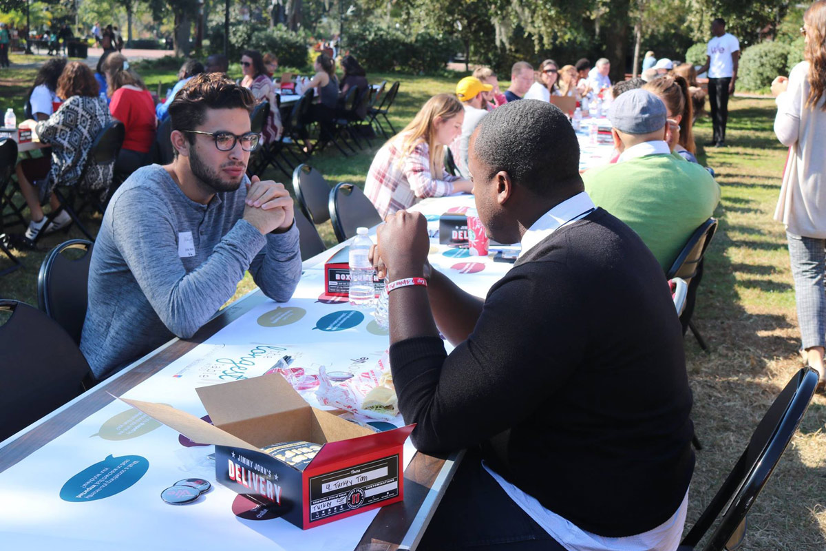Photo of facutly, staff and students participating in The Longest Table @ FSU