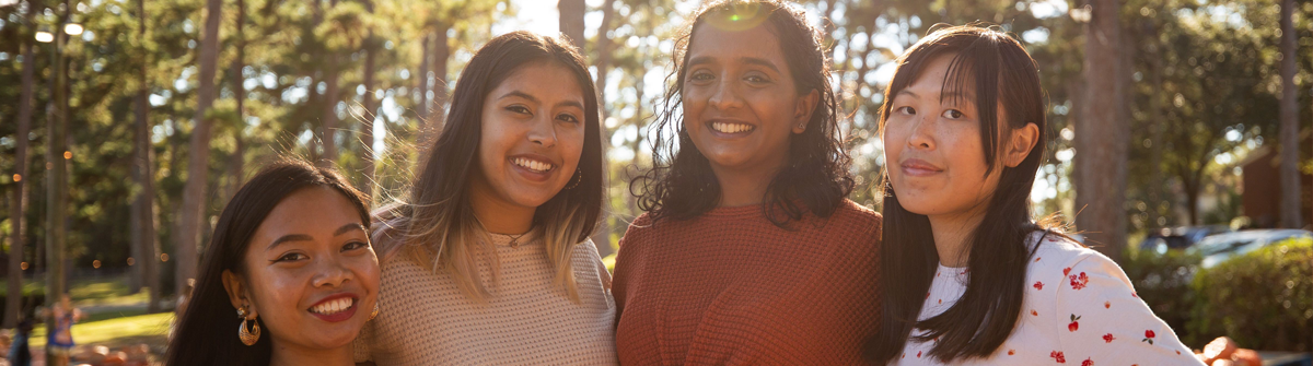 students smiling at camera